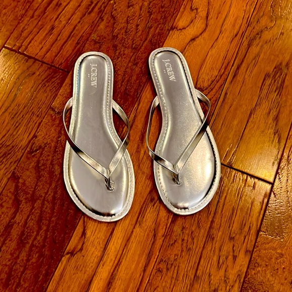 J. Crew silver flip flops. Size 9